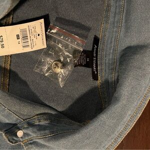 Denim jumpsuit with destroyed right knee size 14